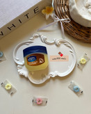 وازلین اصل درب آبی برای نرم کردن لب و ترمیم پوست رایحه کاکائویی