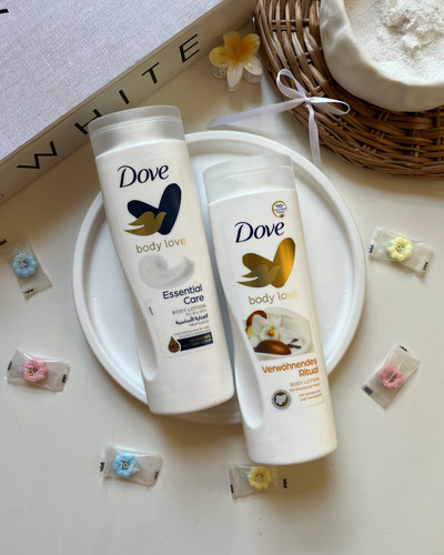 خرید ارزان قیمت لوسیون ابرسان بدن داو dove رایحه شیر خوشبو نرم کننده