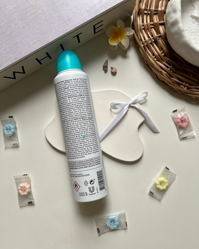 اسپری داو Original با بستهبندی ساده و کلاسیک رایحه شیر