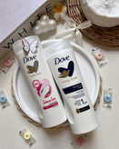 خرید ارزان قیمت لوسیون ابرسان بدن داو dove رایحه شیر خوشبو نرم کننده