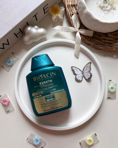 شامپو بیوکسین ضد ریزش مو و ترمیم کننده مو Bioxcin حاوی آرگان و کراتین هیدرولیز شده 300 میل
