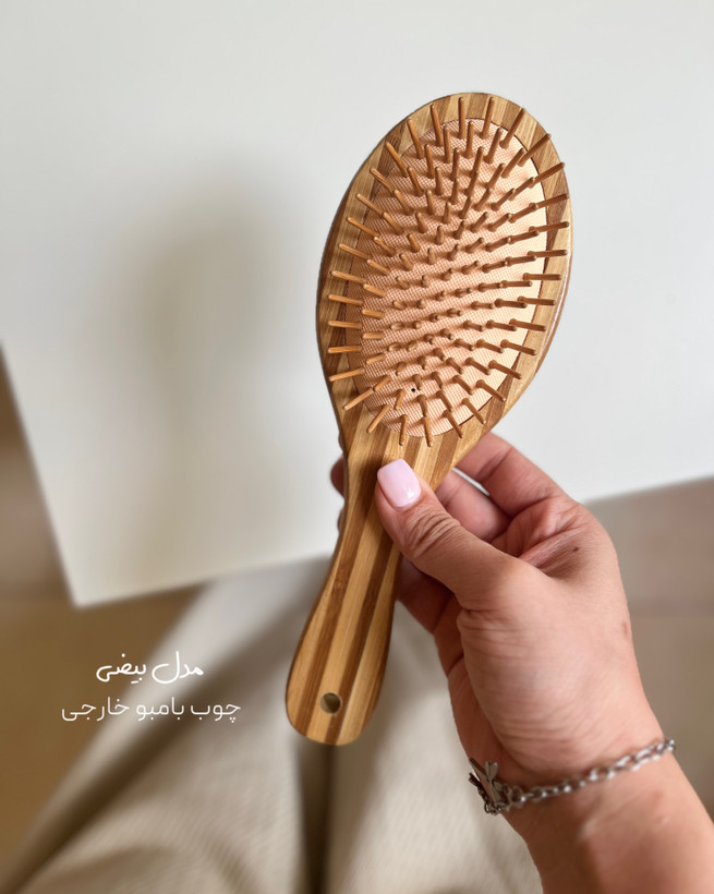 شانه چوبی طبیعی مناسب انواع مو با طراحی سبک و ضد الکتریسیته ساکن